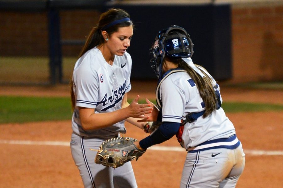 	<p>Senior pitcher Estela Piñon strategizies with junior catcher Chelsea Goodacre during the game against Utah on Saturday at Hillenbrand Stadium. Piñon and fellow senior pitcher Kenzie Fowler are working on walking fewer batters.</p>