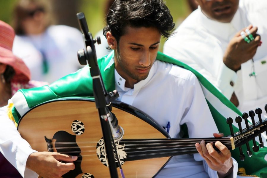 Rebecca Marie Sasnett / Daily Wildcat

Muhammad Bin Khnain, freshman english major from Saudi Arabia, performs a traditional Lebanese folk song on the Oud during the Center for English as a Second Language International Festival on Wednesday on the UA Mall. The Oud, an instrument similar to a guitar with no frets, is commonly used in music from Arabic, Jewish, Greek, Armenian and other eastern countries.
