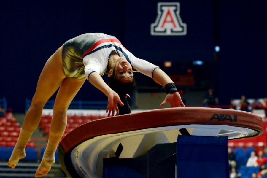 Rebecca+Noble%2F+The+Daily+Wildcat%0A%0ASophomore+all-around+Shelby+Edwards+performs+her+vault+routine.+Edwards+and+Allie+Flores+won+the+Pac-12+vault+title.+Arizona+finished+sixth+in+the+Pac-12+Championships.+