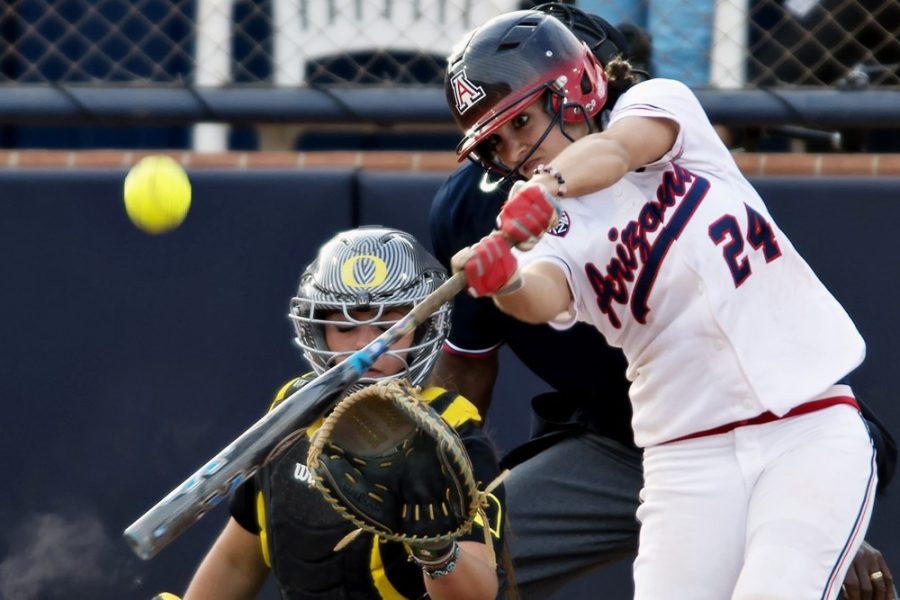 Carlos Herrera / The Daily Wildcat

Arizonas Kelsey Rodriguez blasts a two run homer in the third inning at Hillenbrand Memorial Stadium on Thursday, May 8, 2014 in Tucson, Ariz. The No. 9 Wildcats fell to No. 1 Oregon, 7-3, in the first of three games at Hillenbrand.

