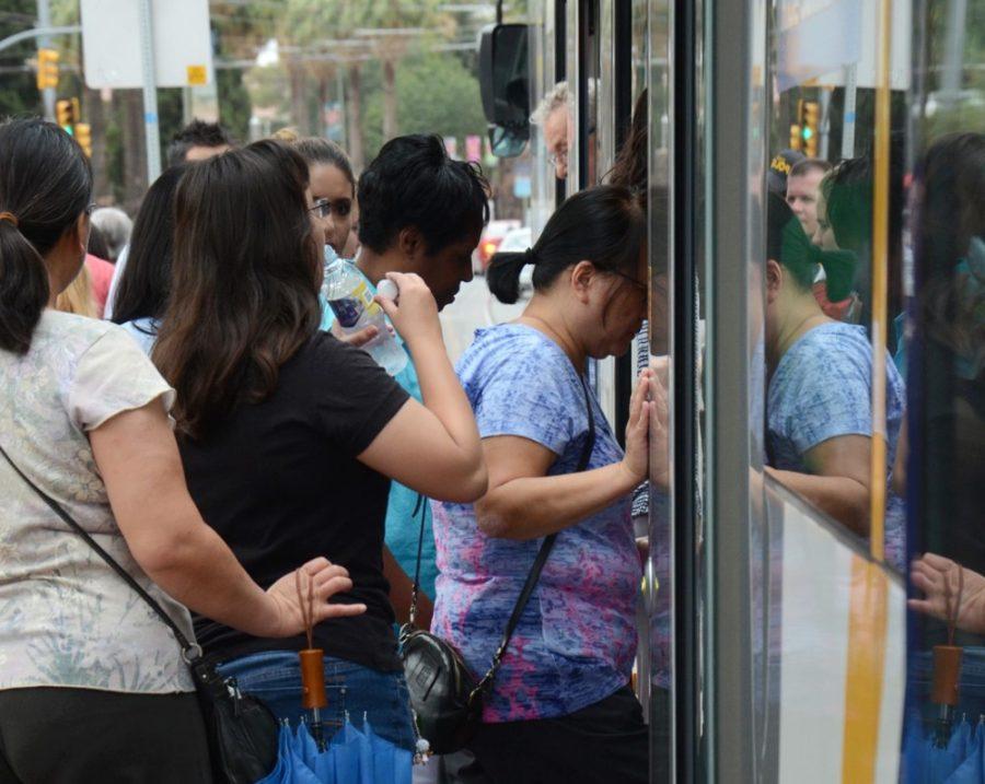	Tucsonans boarded the new Sun Link Tucson Modern Streetcar at the University Boulevard and Tyndall Avenue stop on July 25. Free 30-day passes are currently available to UA students and faculty. 