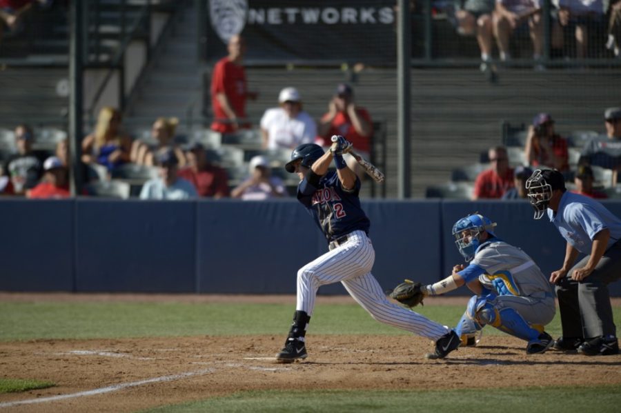 %09Arizona+sophomore+infielder+Kevin+Newman+%282%29+hits+a+base+hit+during+Arizona%26%238217%3Bs+6-5+win+against+UCLA+at+Hi+Corbett+Field+on+April+13.+Newman+made+Cape+Cod+Baseball+League+history+by+leading+the+league+in+batting+average+for+two+consecutive+seasons.