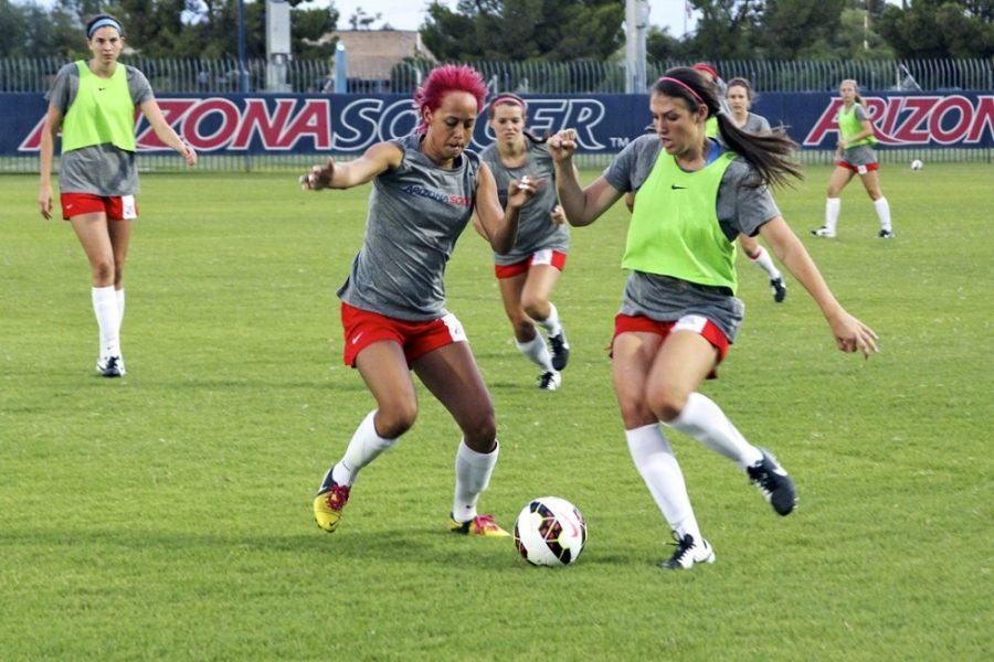 %09The+Arizona+soccer+team+practices+before+the+start+of+the+2014+season.+The+Wildcats+opened+the+season+with+a+2-0+win+over+Florida+International+University.