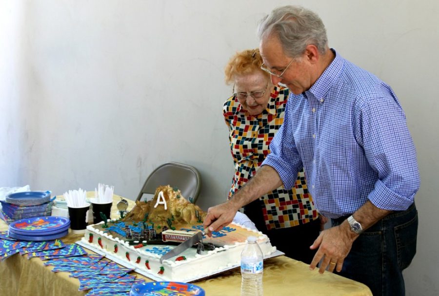Kyle Hansen / The Daily Wildcat

Mayor Jonathan Rothschild cuts the cake during Tucsons birthday celebration at the Southern Arizona Transportation Museum on Saturday, Aug. 23, 2014 in Tucson, Ariz. Tucson is 239 years old