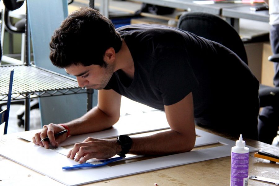 	Architecture senior Jose Gonzalez works on a design project at the College of Architecture, Planning & Landscape Architecture on Tuesday. The college recently added an associate dean of research to help increase the college’s research efforts.