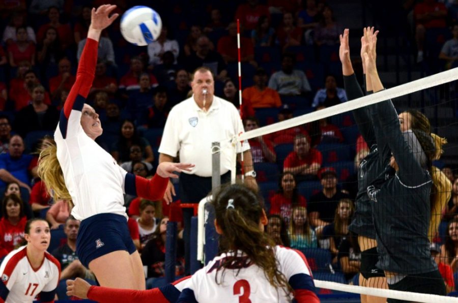 	Arizona senior outside hitter Madi Kingdon (9) spikes the ball during Arizona’s 3-0 win against CSUN in the Arizona Invitational on Sept. 6 in McKale Center. Kingdon and the Wildcats close out nonconference play this weekend.