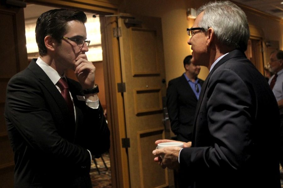 Savannah Douglas / The Daily Wildcat

Caleb Rhodes (left), president of the University of Arizona College Republicans, speaks with Congressman David Schweikert on Saturday at the Raddison Hotel, 6555 E Speedway Blvd,  to support the Republican candidates through a unit rally and fundraiser. Students from Arizona State University and various Republican members of the Tucson community were in attendance. 
