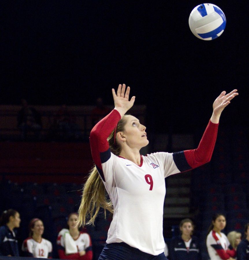 	Arizona senior outside hitter Madi Kingdon (9) serves the ball during the last set of the UA’s 3-0 win against Tulane on Friday in McKale Center. The Wildcats now prepare for Pac-12 Conference rival ASU on Wednesday as conference play opens.