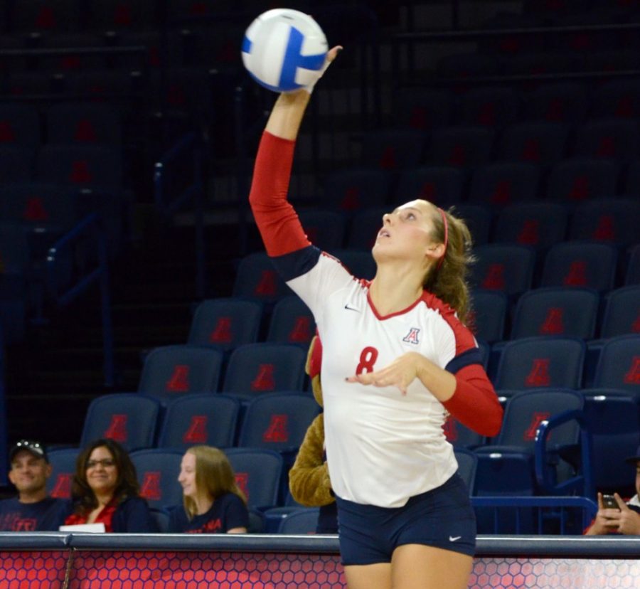 	Rachel Rhoades (8) serves the ball at the beginning of UA’s 3-0 win against Loyola on Sept. 5, 2014 in McKale Center. Rhoades has 47 kills on the season and has played 29 sets in her senior season.