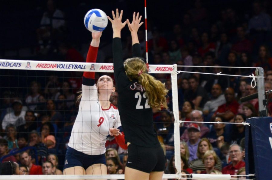 <p></p><p>Arizona senior outside hitter Madi Kingdon (9) spikes the ball past Stanford junior setter Madi Bugg (22) during Arizona's 3-1 loss against No. 1 Stanford in McKale Center on Friday. Last week, the Wildcats defeated California but suffered a close loss to Stanford.</p>
