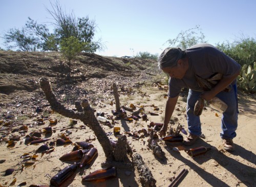 Pablo collects bottles on an October afternoon. Pablo says he enjoys the quiet of the desert, and the time the trips give him to think.