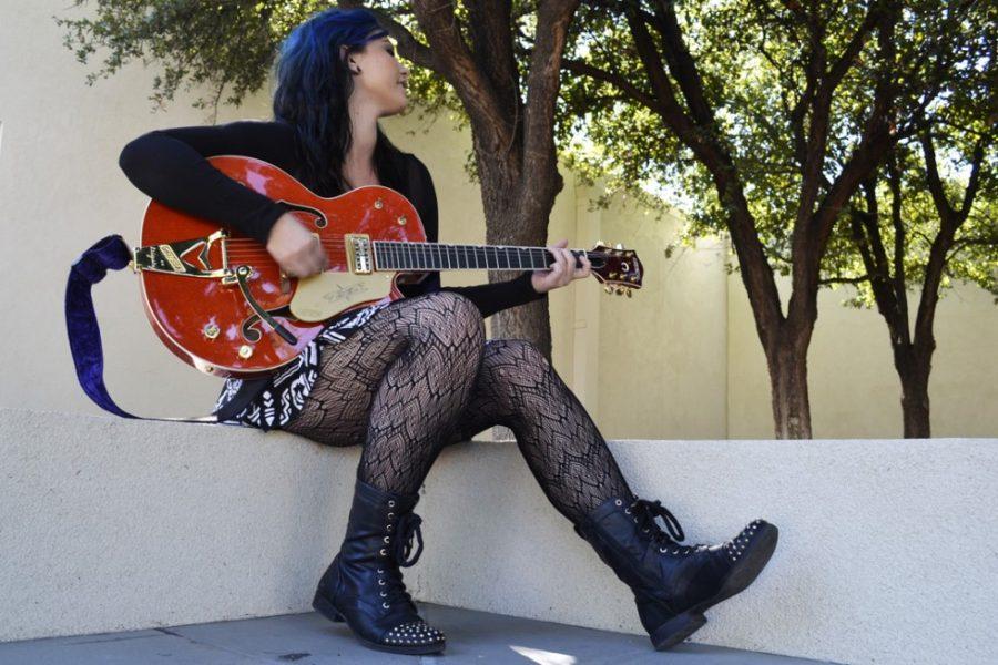 Layla Nicks / The Daily Wildcat

Adara Rae, the guitarist of Adara Rae and the Homewreckers, plays a few chords at Pima Community College Campus Monday Oct. 13, 2014. Adara Rae, 19, plays many shows around the central Tucson area accompanied by her all female ensemble.
