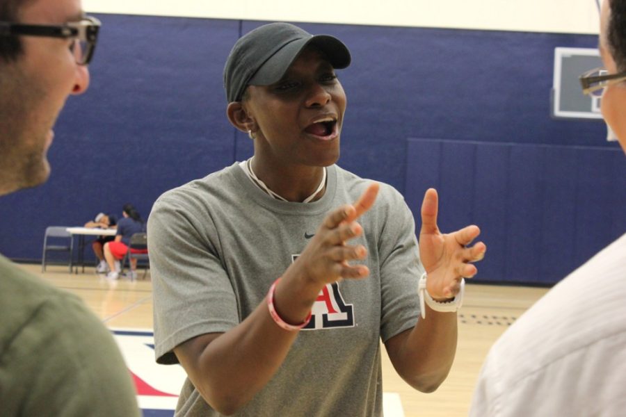 Arizona+womens+basketball+head+coach+Niya+Butts+talks+with+media+members+after+the+first+practice+of+the+year+in+Richard+Jefferson+Gymnasium+on+Wednesday.+Butts+spoke+on+moving+on+from+last+season+and+newfound+depth.