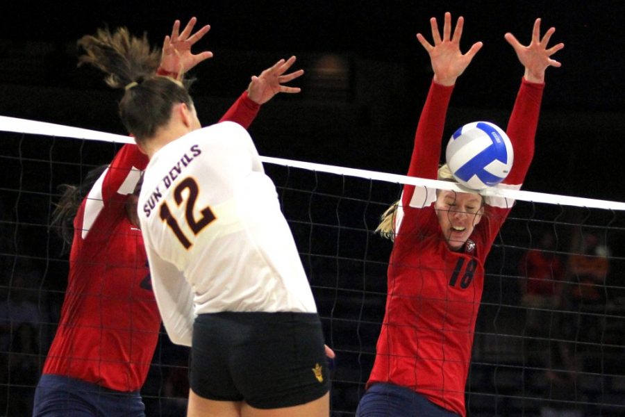 %09Arizona+sophomore+setter+%2820%29+Penina+Snuka+and+Arizona+redshirt+freshman+middle+blocker+McKenzie+Jacobson+%2818%29+block+ASU+junior+outside+hitter+Macey+Gardner%26%238217%3Bs+spike+during+Arizona%26%238217%3Bs+3-2+win+against+ASU+in+McKale+Center+on+Sept.+24.+Arizona+volleyball+head+coach+Dave+Rubio+praised+his+squad+after+the+Wildcats+defeated+UCLA.