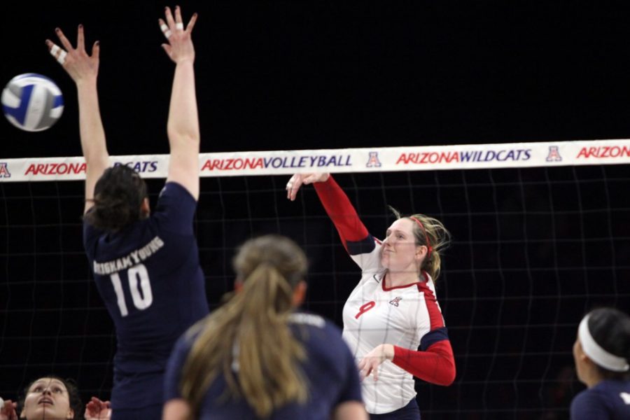 Arizona+volleyball+outside+hitter+Madi+Kingdon+%289%29+spikes+the+ball+past+BYU+middle+blocker+Amy+Boswell+%2810%29+during+Arizonas+3-1+loss+in+the+second+round+of+the+NCAA+Division+I+Championship+Tournament+in+McKale+Center+on+Friday.+Kingdon+ends+her+Arizona+career+as+one+of+the+most+decorated+players+in+program+history.