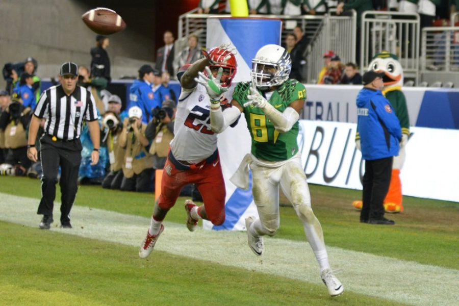 Arizona+wide+receiver+Spencer+Marciniak+%2825%29+attempts+to+deter+Oregon+wide+receiver+Darren++Carrington+%2887%29+as+he+catches+a+touchdown+pass+during+Arizonas+51-13+loss+to+Oregon+in+the+Pac-12+Conference+Championship+game+at+Levis+Stadium+in+Santa+Clara%2C+Calif.
