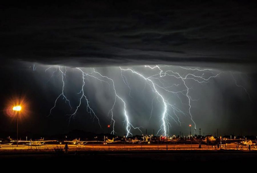Courtesy of Scott Wood Lightning strikes over the Chandler Municipal Airport. Lightning events may increase in the U.S. due to rising temperatures as a result of climate change; however, UA researchers say there are many complex factors that contribute to lightning strikes which makes making predictions difficult.