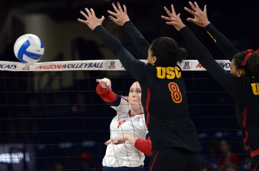 <p></p><p>Arizona outside hitter Madi Kingdon (9) spikes the ball past the USC defense during Arizona's 3-1 loss to USC on Nov. 26 in McKale Center. Kingdon and the Wildcats take on Yale in the first round of the NCAA Tournament today.</p>