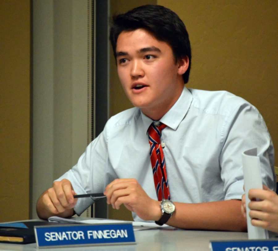 Associated Students of the University of Arizona Sen. Michael Finnegan responds to an idea brought up by an attendee of the weekly ASUA Senate meeting in the Student Union Memorial Center on Wednesday. The senate discussed further changes to the election code.