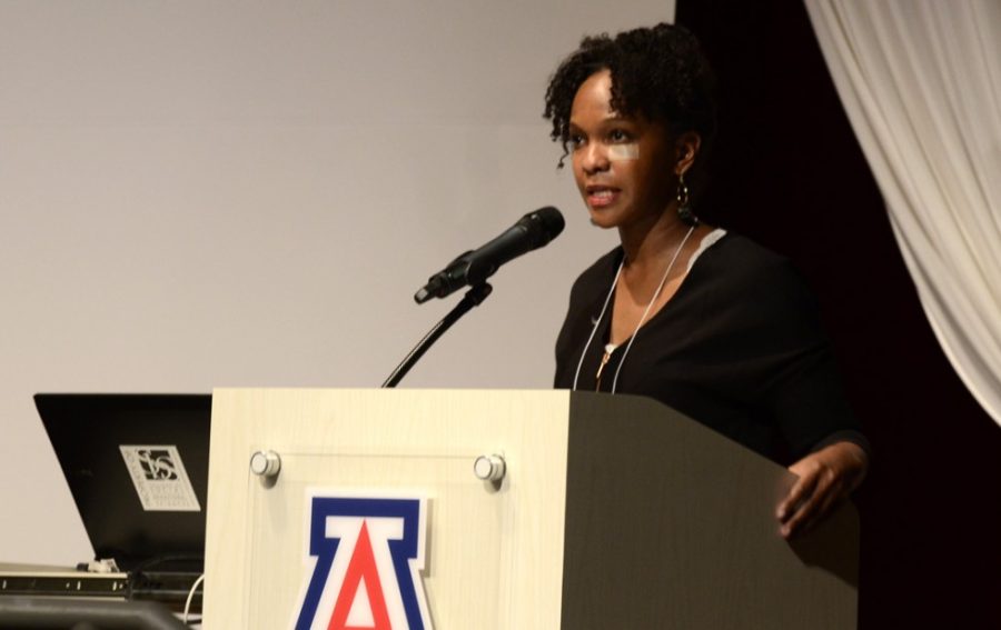 Tanner Clinch/ The Daily Wildcat

Imani Perry takes the podium at the Black Life Matter conference that took place at the University of Arizona in Tucson on Jan. 15, 2015. Her keynote speech discussed the systematic oppression of black people in America by police, education and healthcare systems 

