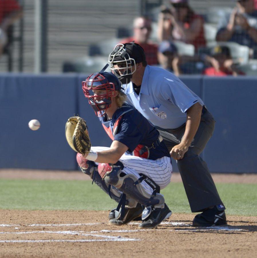 File Photo / The Daily WildcatArizona baseball catcher Riley Moore  catches a warm-up pitch during Arizonas 6-5 victory over UCLA on April  13, 2014 at Hi Corbett Field. After a down year, Moore and the Wildcats  are looking to turn around the program this season.