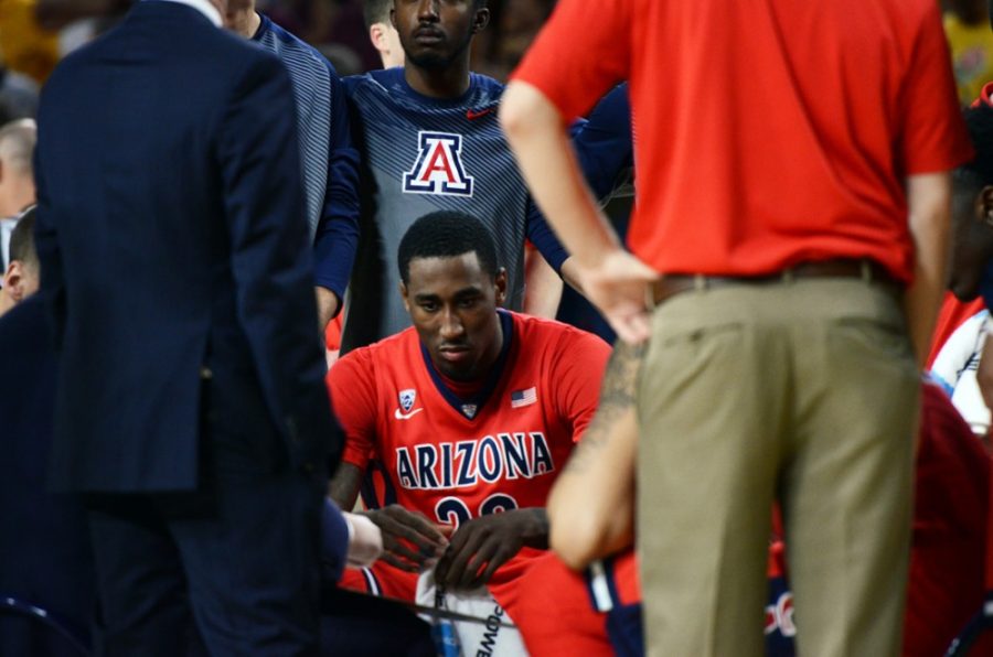 Arizona+forward+Rondae+Hollis-Jefferson+%2823%29+sits+in+the+team+huddle+during+Arizonas+81-78+loss+to+ASU+at+Wells+Fargo+Arena+in+Tempe+on+Saturday.+Hollis-Jefferson+and+the+Wildcats+potentially+lost+the+chance+to+secure+a+No.+1+seed+in+the+NCAA+tournament+by+losing+to+ASU.