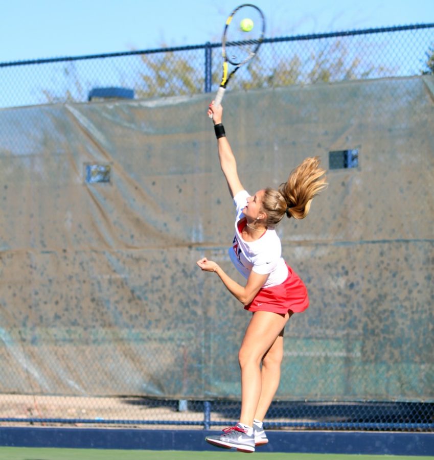Arizona womens tennis player Inge Hendrikx serves during her 6-3 singles match win against Sacramento State tennis player Loaiza Esquivias at the LaNelle Robson Tennis Center on Sunday. Both Arizonas mens and womens teams had successful weekends.