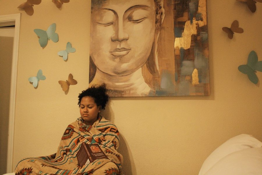 Priscilla Vargas, a pre-business sophomore, finds peace in her room in The Ranch at Star Pass on Monday evening. The class Effective and Engaged: Mindful Meditation to Strengthen Focus and Tame Stress offers an opportunity for meditation on campus.