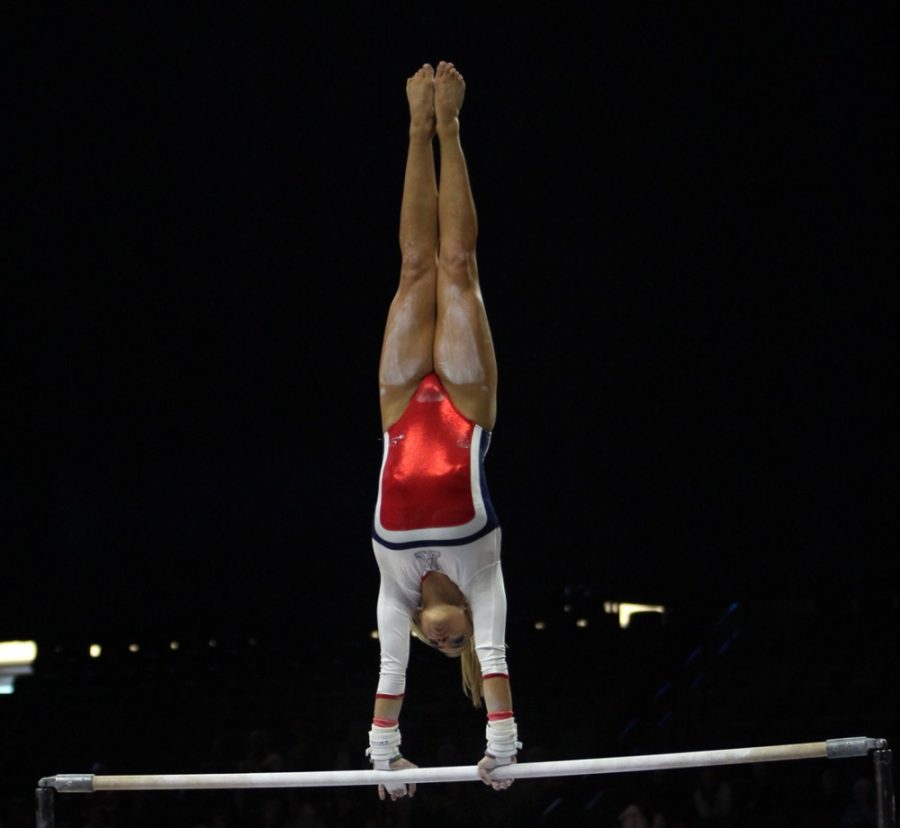 Arizona gymnast Gabby Laub performs her uneven bars routine during Arizonas 197.850-196.375 loss to Utah on Jan. 31 in McKale Center. In addition to her on-court performance, Laub has musical talents off the court.