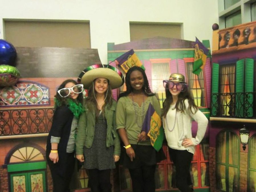 Courtesy of Sho TaniguchiStudents pose in front of a Mardi Gras-themed backdrop at the 2014 Carnivida event at Árbol de la Vida Residence Hall. The fourth-annual event will be held from 8 p.m. to midnight on Saturday.