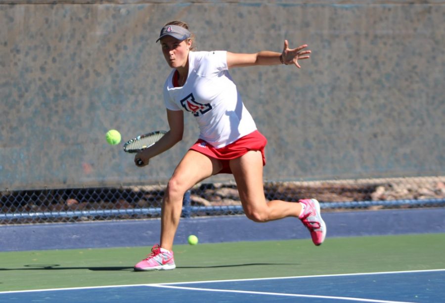 Arizona senior Laura Oldham returns a volley during Arizonas 7-0 victory over Sacramento State on Sunday at the LaNelle Robson Tennis Center. Oldham is the lone senior on this years team and took a unique path to get to Arizona.