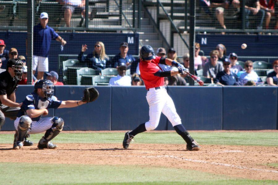 Arizona infielder Kevin Newman gets a hit during Arizonas 6-4 extra innings loss to Rice at Hi Corbett Field on Sunday. The Wildcats may have won Saturdays matchup, but Rice won the three-game series 2-1.