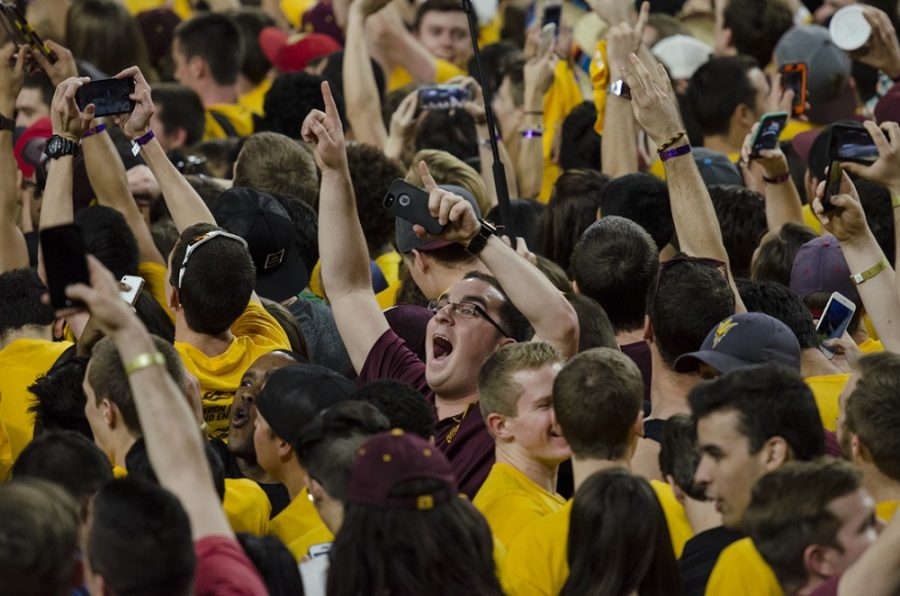 ASU+fans+rushed+the+court+after+the+Sun+Devils+defeated+Arizona+81-78+on+Saturday+at+Wells+Fargo+Arena+in+Tempe%2C+Ariz.+Arizona+suffered+its+second+straight+loss+against+the+Sun+Devils+in+Tempe.+