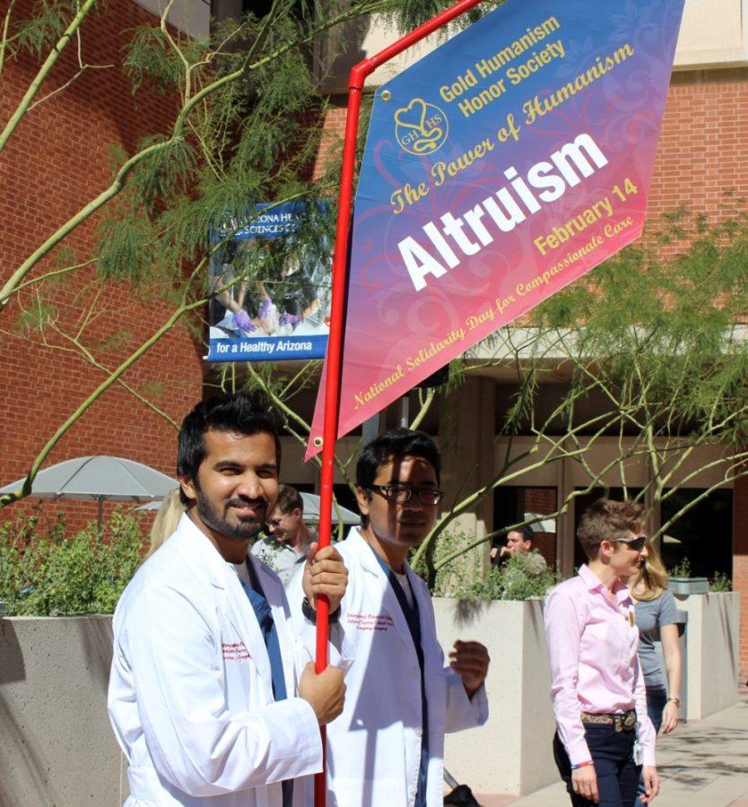 Courtesy of the Arizona Health Sciences CenterMedical students hold signs promoting humanism in medicine as part of the Arizona Health Sciences Centers Solidarity Week on Feb. 14, 2014. The week focuses on emphasizing compassionate care within the medical community.