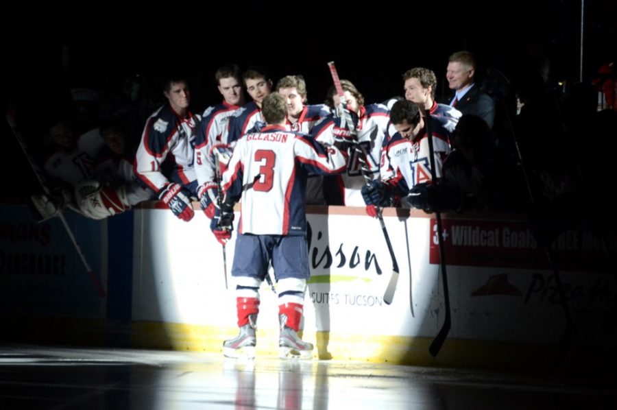Arizona hockey defender Shane Gleason (3) greets his teammates at the start of Arizonas 2-0 loss against ASU at the Tucson Convention Center Arena on Saturday. Gleason and the Wildcats ended their season over the weekend.