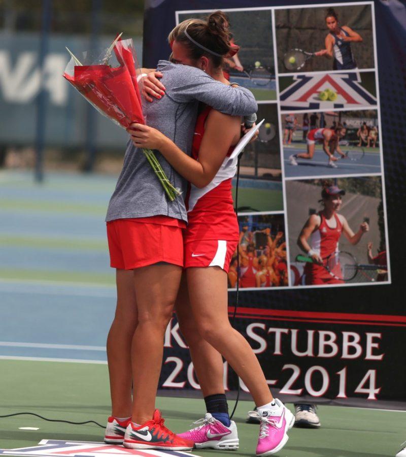 File / The Daily WildcatFormer Arizona womens tennis player and now volunteer asisstant coach Kim Stubbe hugs head coach Vicky Maes during her Senior Day on April 19, 2014 at LaNelle Robson Tennis Center. Stubbe said she came to Arizona because of Maes and stayed because of her attachment to the team. 
