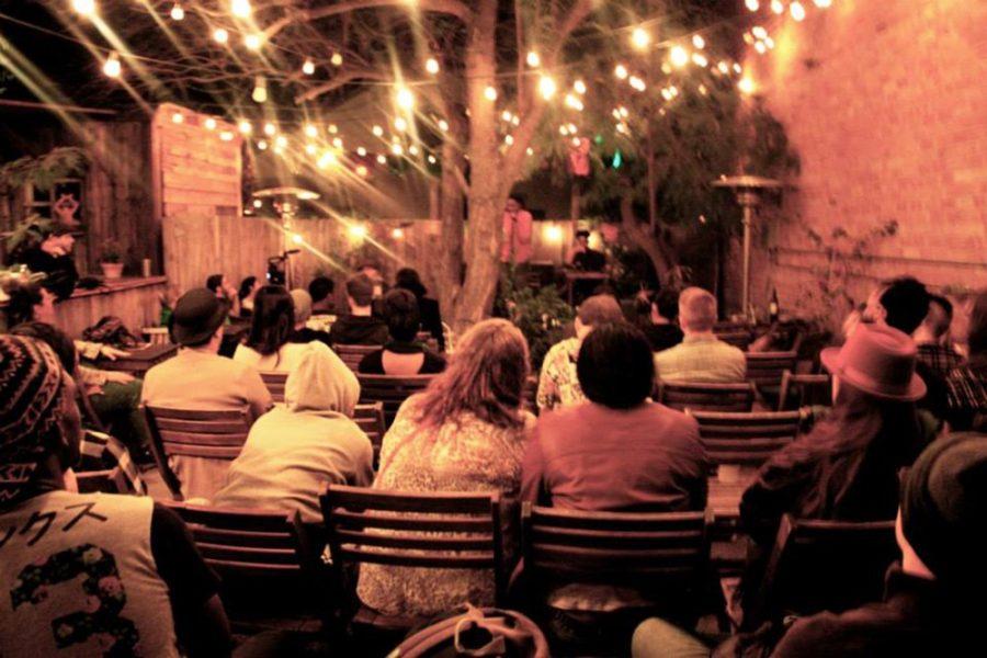 Courtesy of Chelsea GleisnerThe audience in the back courtyard of Café Passe at open mic night on Feb. 22. Every fourth Sunday each month, the cafe hosts a poetry slam called Words on the Avenue.