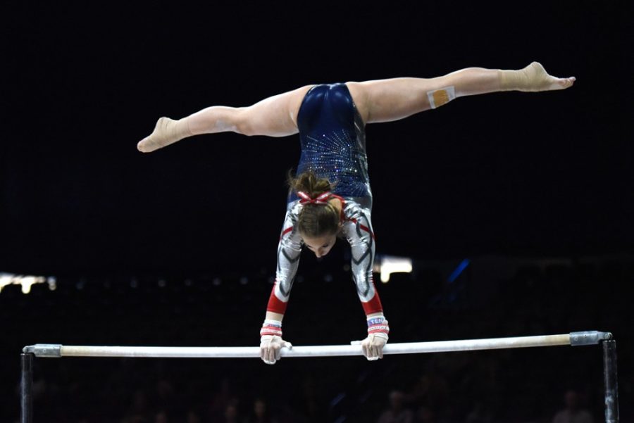 Arizona gymnastics all-around Madison Cindric makes her debut performance on the bars during Arizonas 196.850-196.850 tie with Denver in McKale Center on March 14. Cindric and the Wildcats made the NCAA regionals for the 29th consecutive season.