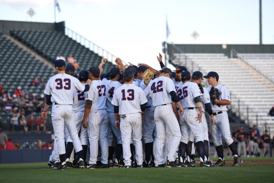 Members of the Arizona baseball team huddle up before the start of their 10-5 victory over Utah on March 13 at Hi Corbett Field. Pac-12 Conference play starts to heat up this week as the Wildcats take on Oregon.