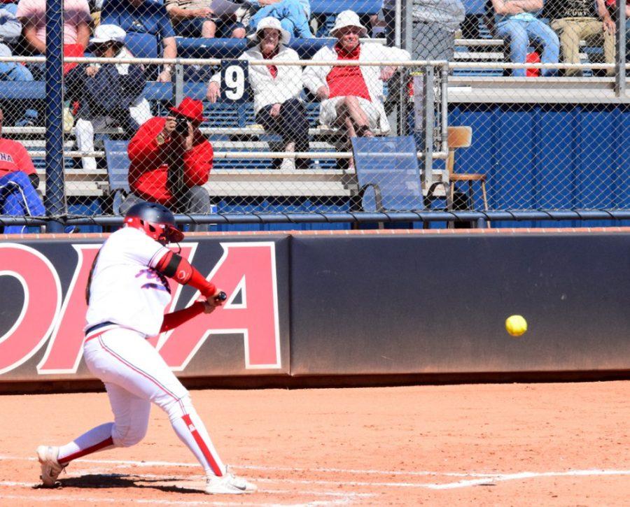 Arizona+softball+catcher+Chelsea+Goodacre+%2877%29+hits+one+of+her+three++home+runs+of+the+day+during+the+first+of+two+games+against+UNLV+on++Wednesday.+Arizona+won+the+first+game+8-4+and+the+second+game+16-6.
