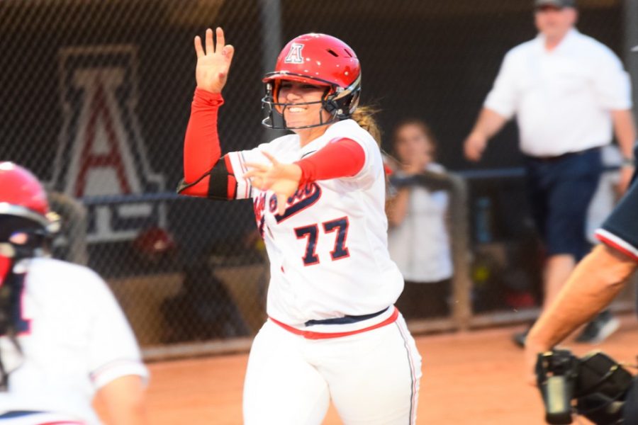 Arizona+softball+catcher+Chelsea+Goodacre+%2877%29+runs+home+to+greet+her+teammates+during+Arizonas+11-1+win+over+ASU+at+Hillenbrand+Stadium+on+Sunday+night.+Goodacre+and+the+Wildcats+lost+the+series+to+ASU+2-1+over+the+weekend.
