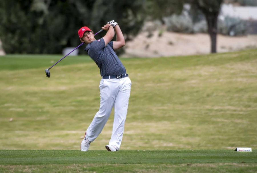 Courtesy of Arizona AthleticsArizona mens golf freshman George Cunningham takes a swing during the National Invitational Tournament on Monday at the Omni Tucson National golf course. Cunningham and the Wildcats finished in 12th place at the NIT.