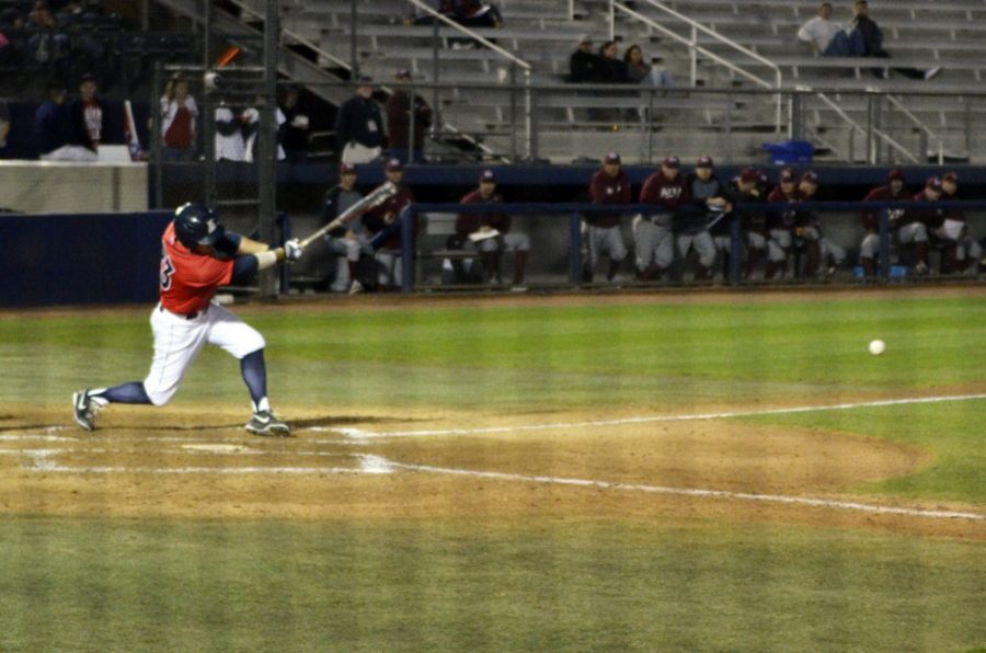 Arizona outfielder Zach Gibbons (23) hits during Arizonas 6-2 win against New Mexico State at Hi Corbett Field on Tuesday. The two teams conclude their two-game series today at 6 p.m. at Hi Corbett Field.