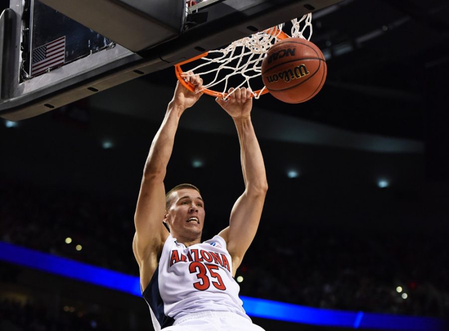 Arizona center Kaleb Tarczewski (35) makes a dunk during Arizonas 73-58 win against Ohio State in the second round of the NCAA tournament in the Moda Center in Portland, Ore. on Saturday afternoon.