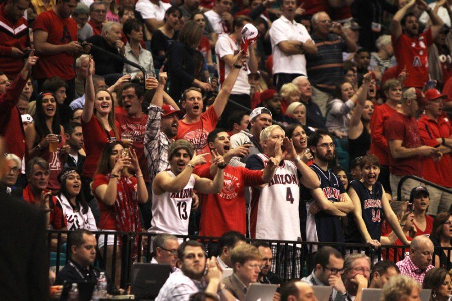 Arizona fans cheer toward the end of Arizonas 70-64 win against UCLA in the semifinals of the 2015 Pac-12 Mens Basketball Tournament in Las Vegas, Nev., on March 13. Arizona fans have traveled in droves to see the Wildcats for both the Pac-12 tournament and NCAA Tournament play.