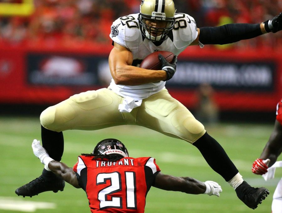 New Orleans Saints tight end Jimmy Graham leaps over Atlanta Falcons cornerback Desmond Trufant for yardage during the first half on Sunday, Sept. 7, 2014, at Georgia Dome in Atlanta. (Curtis Compton/Atlanta Journal-Constitution/MCT)