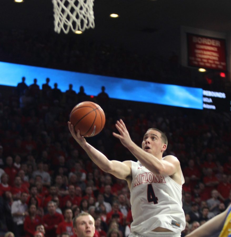 Arizona mens basketball guard T.J. McConnell (4) drives to the basket  during Arizonas 57-47 win over UCLA on Feb. 21 in McKale Center.  McConnell and the Wildcats host Cal today.