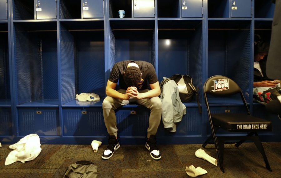 Kentucky's Devin Booker in the Wildcats' locker room following a 71-64 loss against Wisconsin in the NCAA Tournament national semifinal at Lucas Oil Stadium in Indianapolis on Saturday, April 4, 2015. (Charles Bertram/Lexington Herald-Leader/TNS)