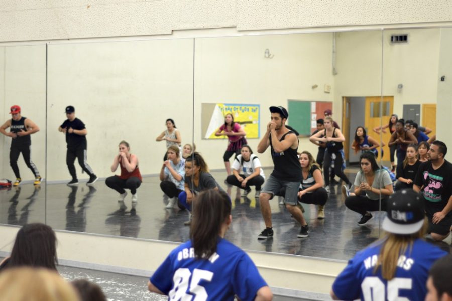 A master class led by Black N Blue Hip Hop Crew choreographer and marketing junior Garrett Biselli practices in the Ina E. Gittings building on Tuesday. The team will be performing at the 1 Block 1 Day 24-hour block party on Saturday.