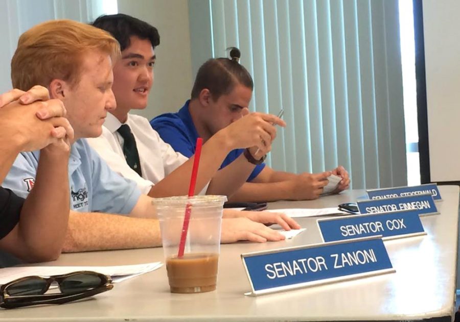 Associated Students of the University of Arizona Sen. Michael Finnegan, second from right, speaks during ASUA Senates weekly meeting on Wednesday in the Student Union Memorial Center. The meeting focused on the issue of DREAMers and their ability to attend college.